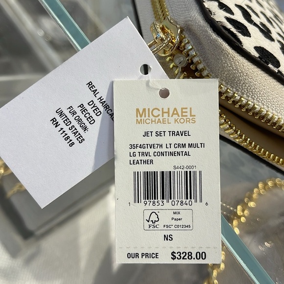 MICHAEL KORS
Leather Lg Continental Wristlet Phone Wallet Exotic Print Hair Calf - Picture 9 of 16